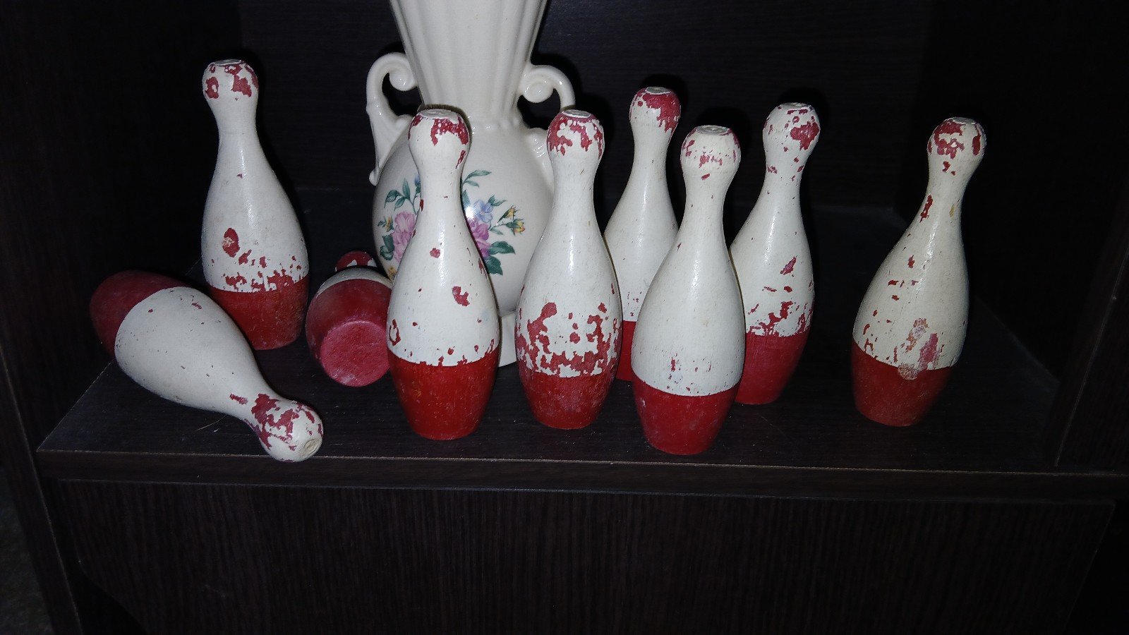Nine Toy Vintage Bowling Pins.