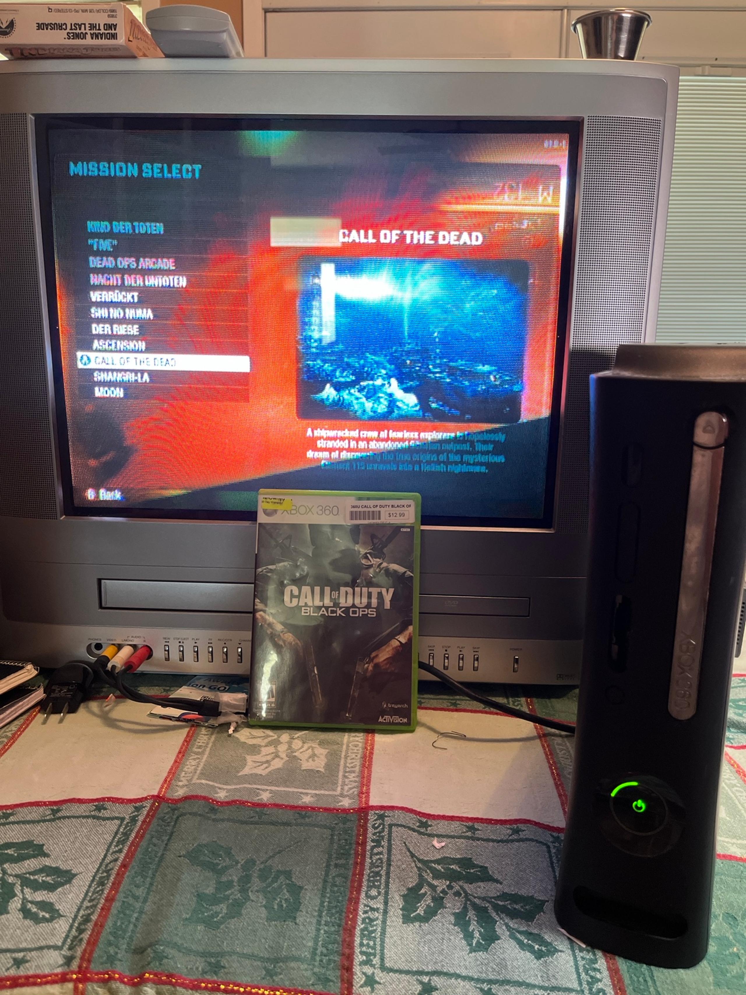 120 gig Xbox 360 with Black Ops zombie dlc and other games