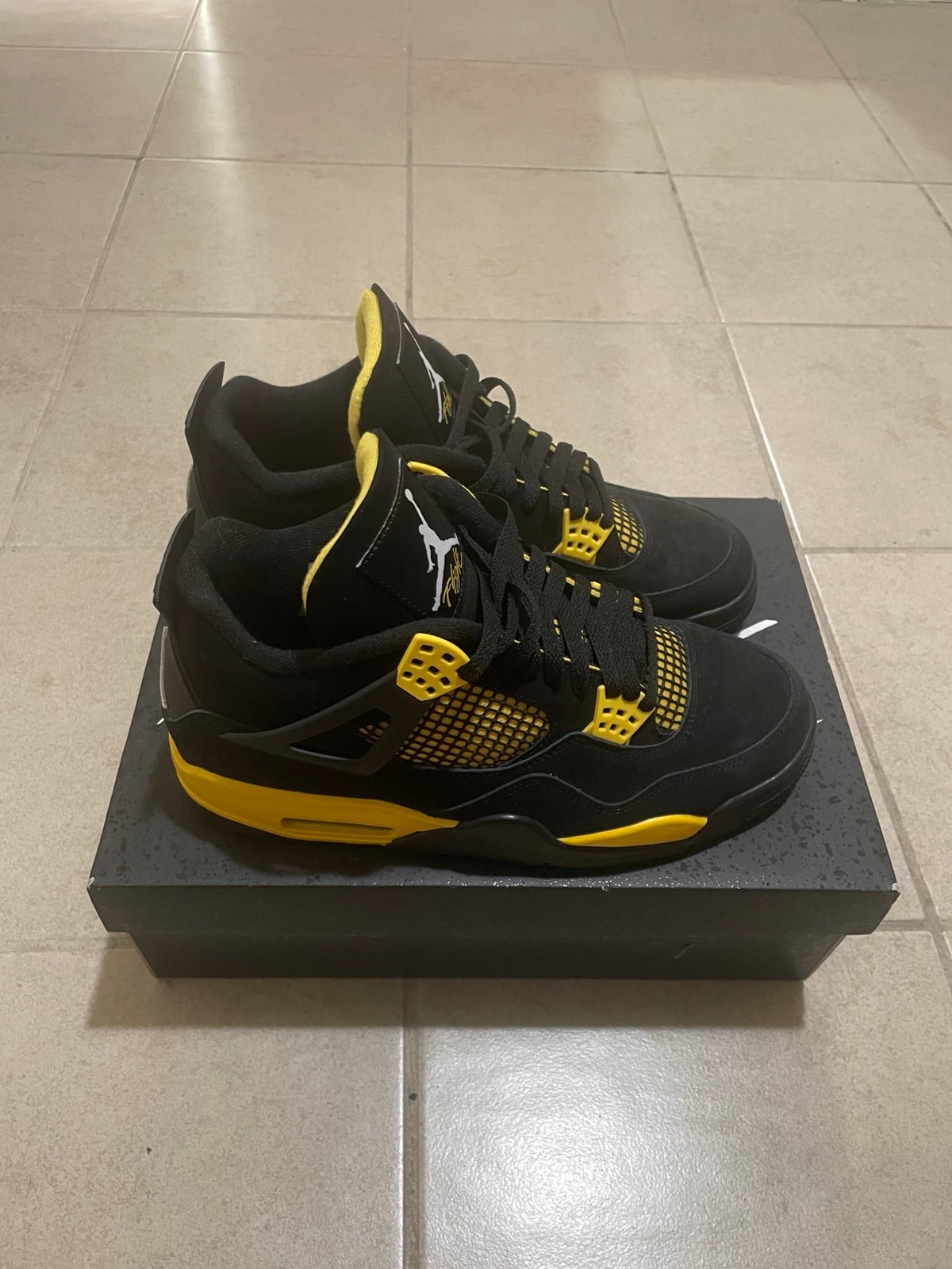 Yellow Thunders Jordan 4s