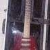 Rogue Rocketeer, red electric guitar 6-string.
