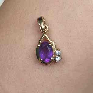 14k gold purple topaz / diamond pendant