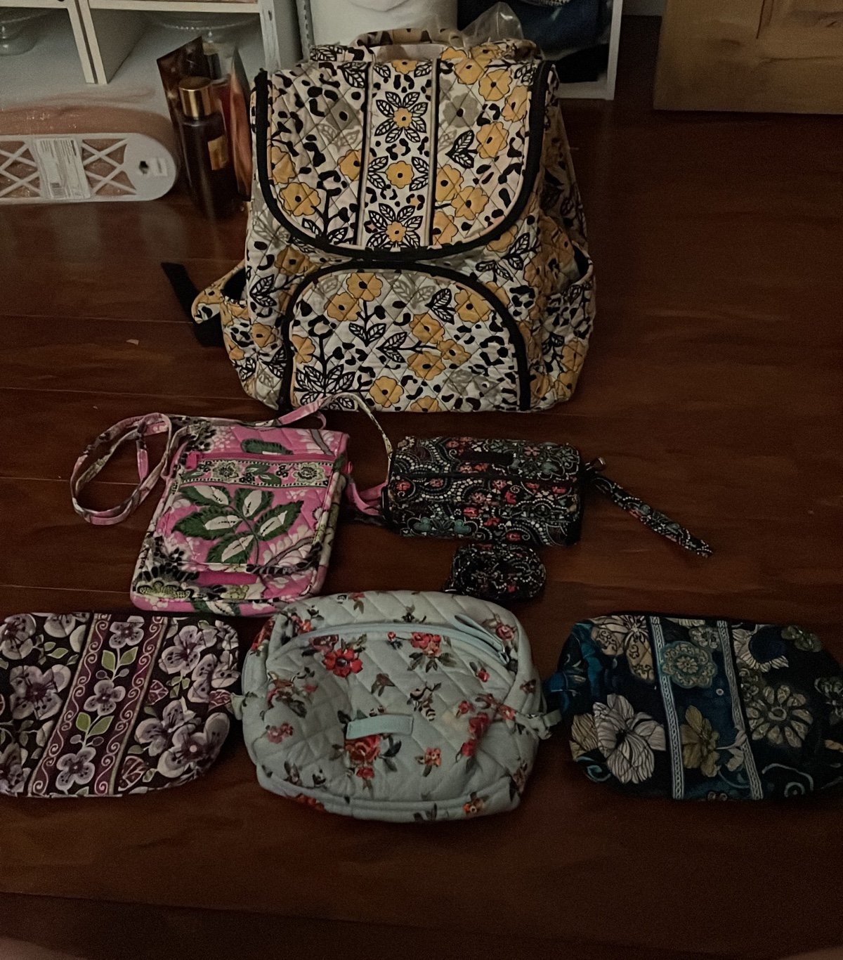 Vera Bradley lot: 2 crossbody, 1 backpack, 3 make up cases
