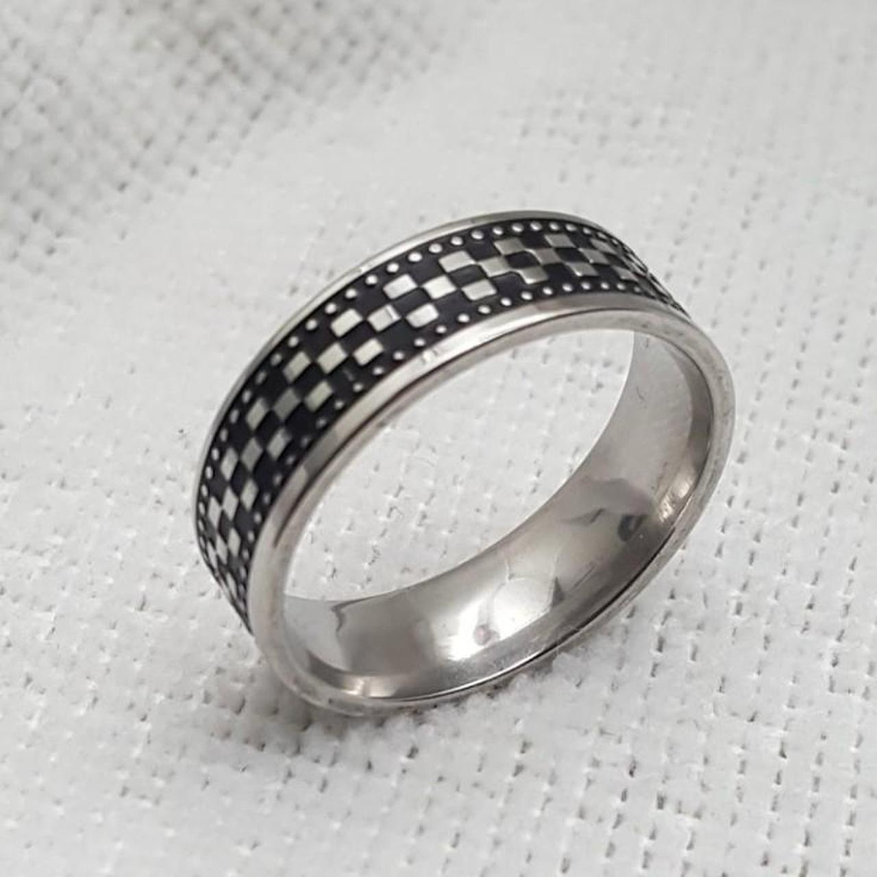 Silver With Tribal Design And Black Background Ring