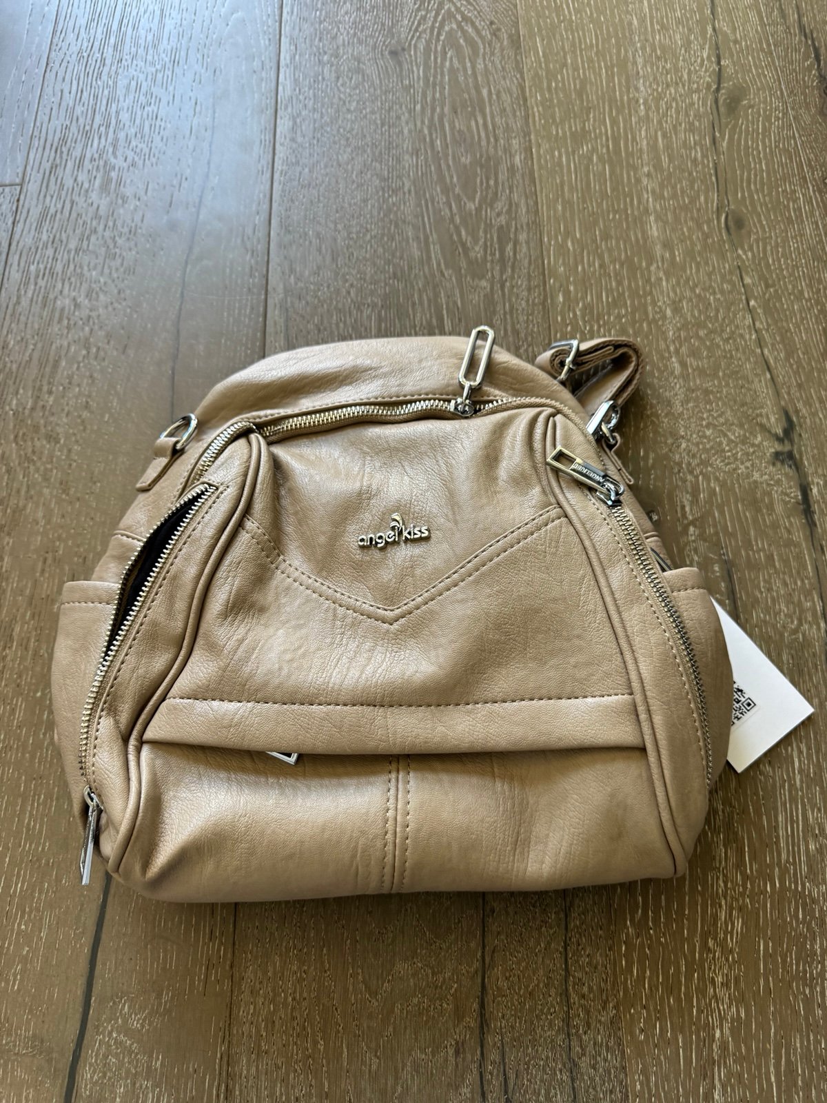 Angel Kiss tan backpack