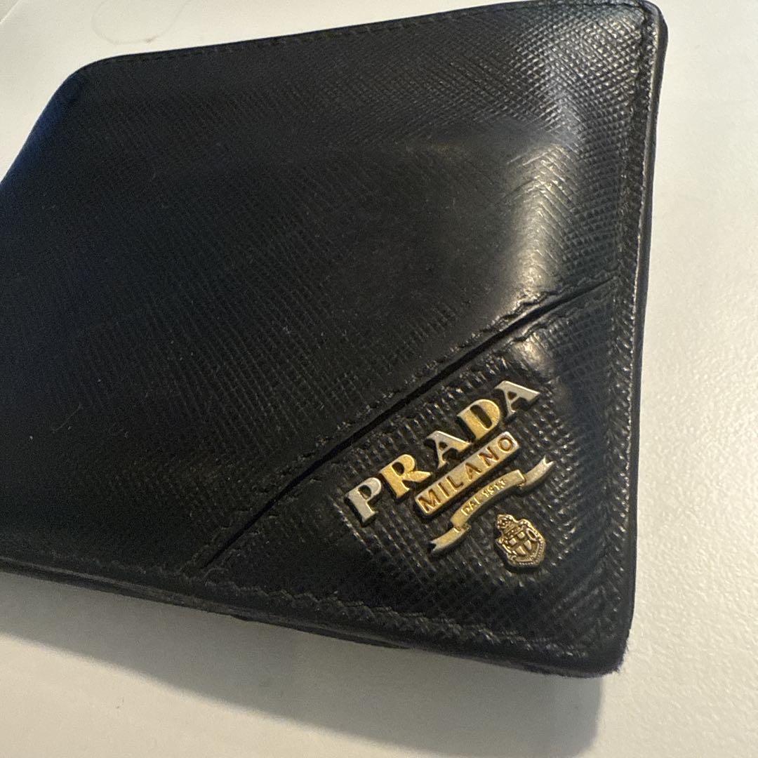 Prada black wallet with gold logo