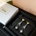 miumiu Eiffel Tower fringed two-tone earrings