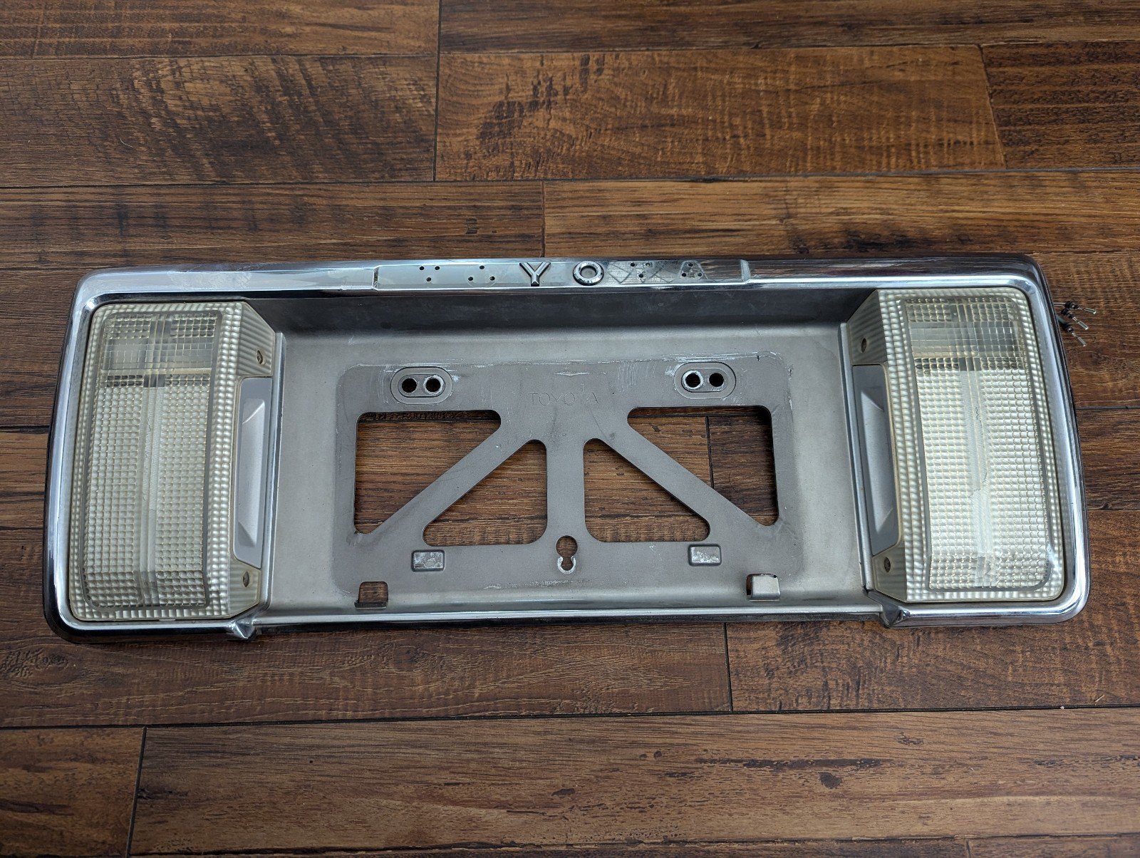 OEM 1989-1995 Toyota 4Runner Rear License Plate Garnish Trim Silver Tailgate