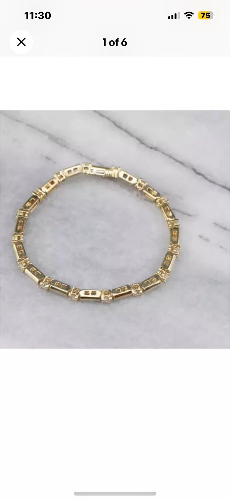 14 karat gold finish and lab created diamond bracelet.
