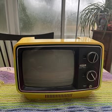 Cute vintage little yellow tv