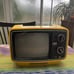 Cute vintage little yellow tv