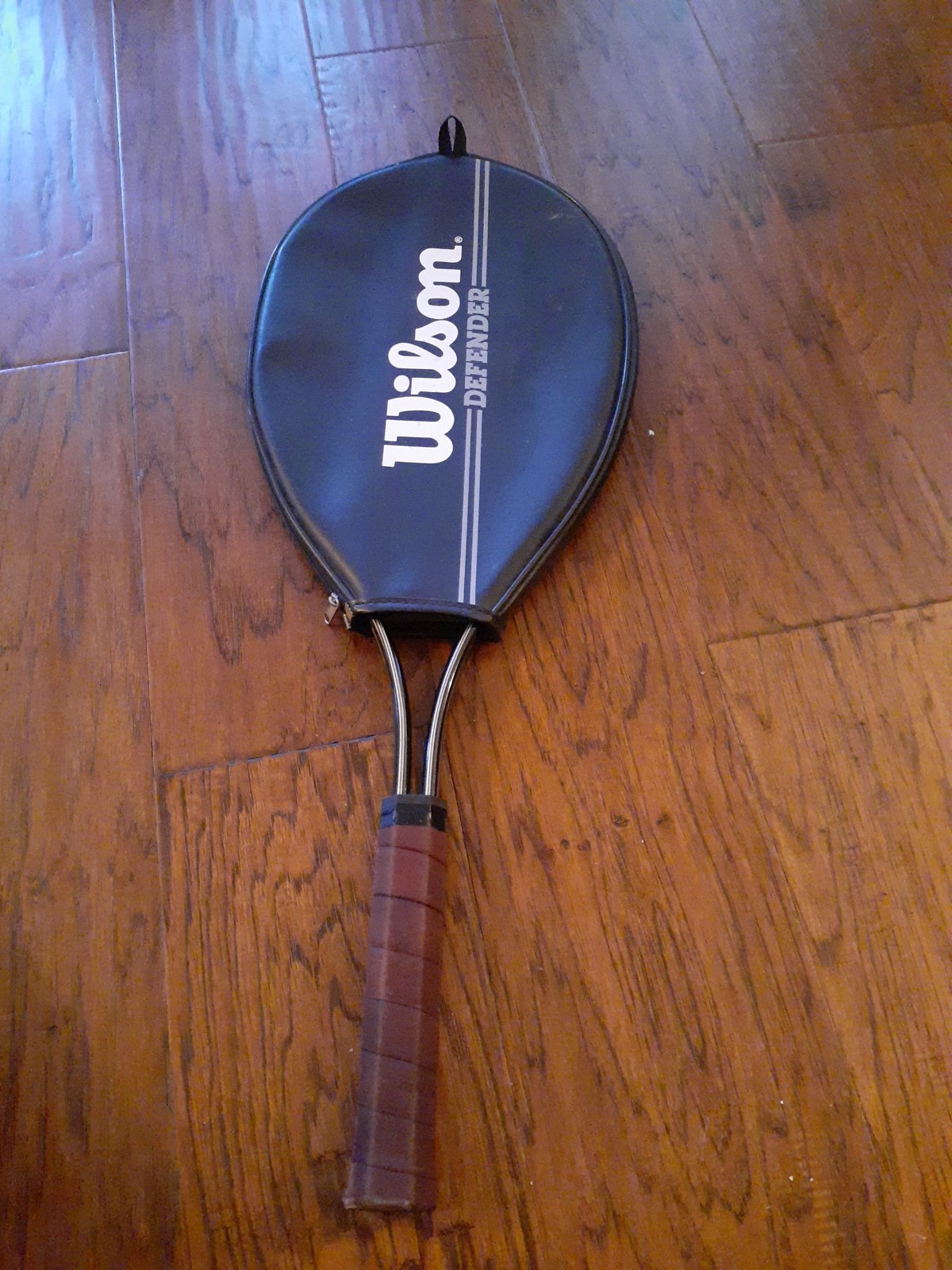 BRAND NEW Wilson Defender Tennis Racket in Leather Cover.