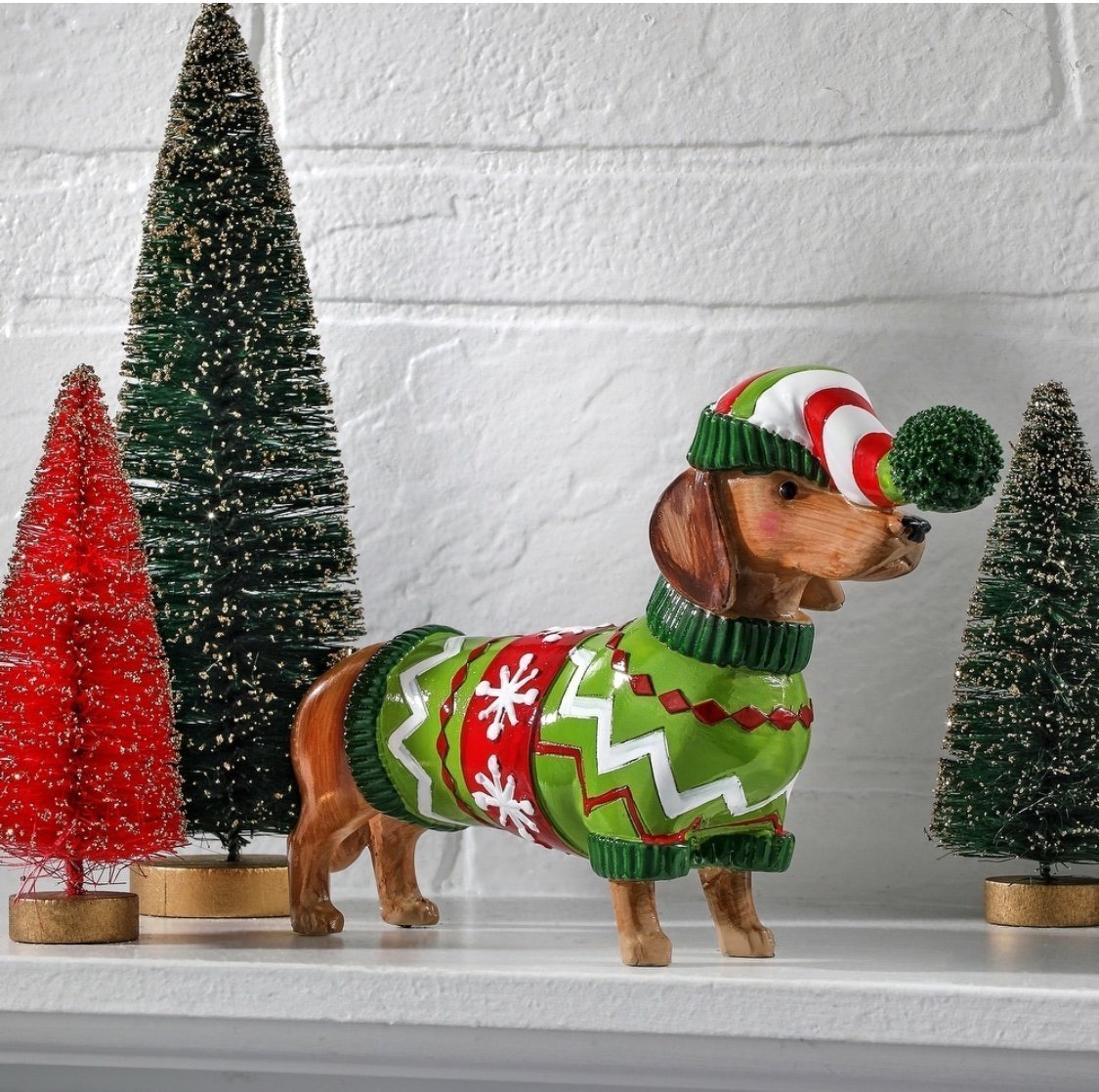 Large Dachshund with Christmas hat and sweater