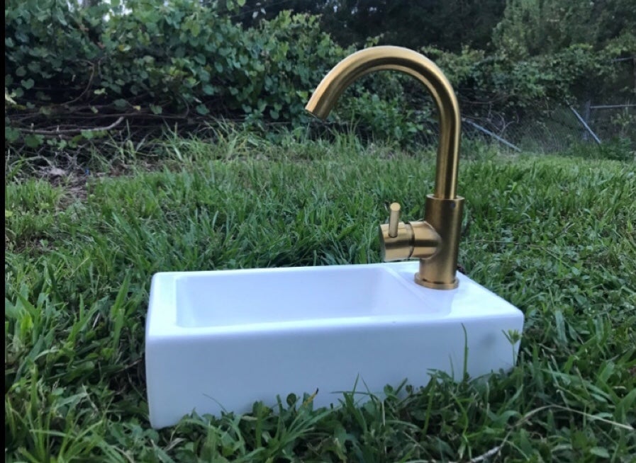 Half bathroom sink with golden brush faucet bundle