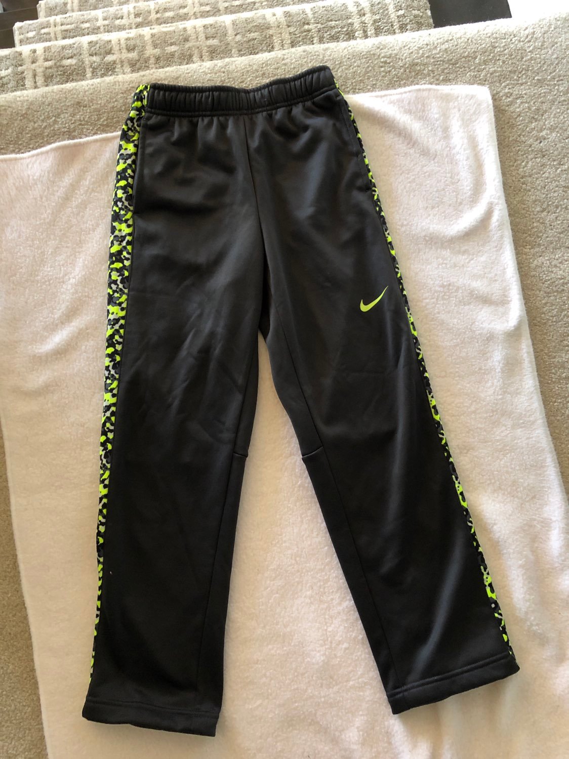 boy's dark grey/neon Nike sweatpants