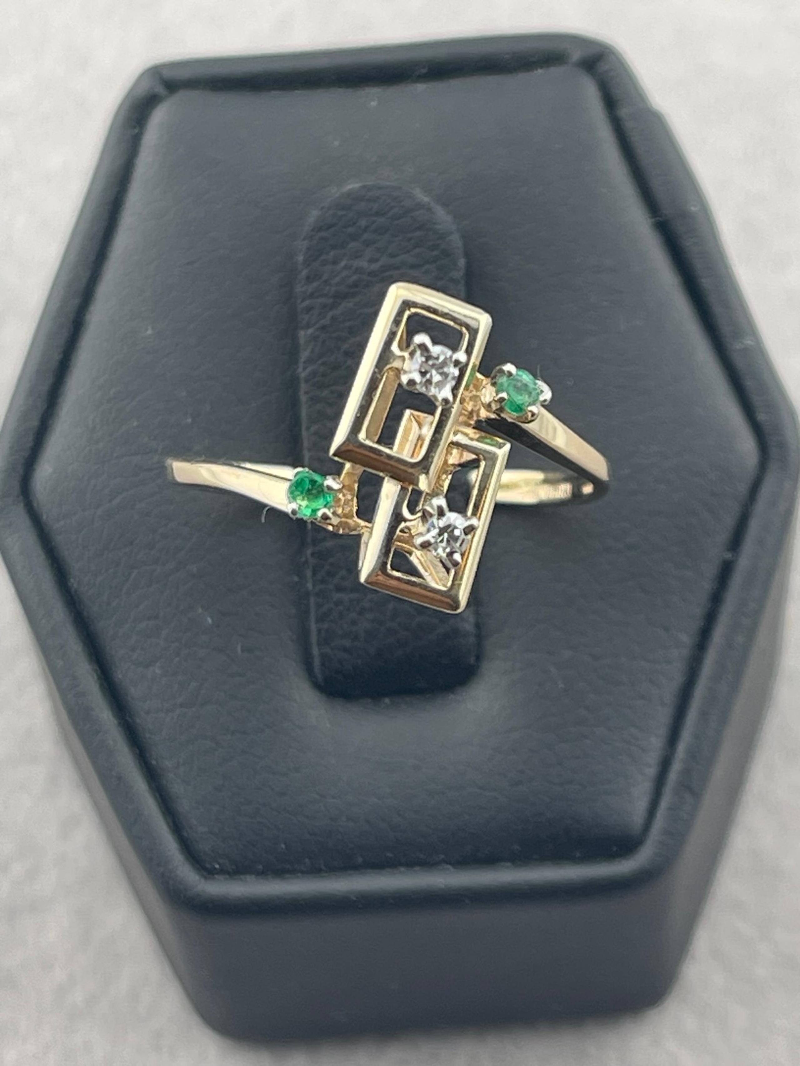 Antique art, deco, unique emerald, and diamond ring 14 karat yellow gold