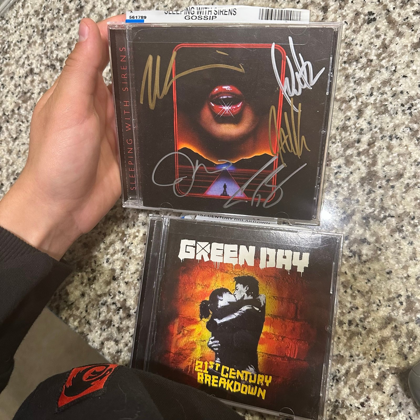 Signed sleeping with sirens cd and Green Day 21st century breakdown cd