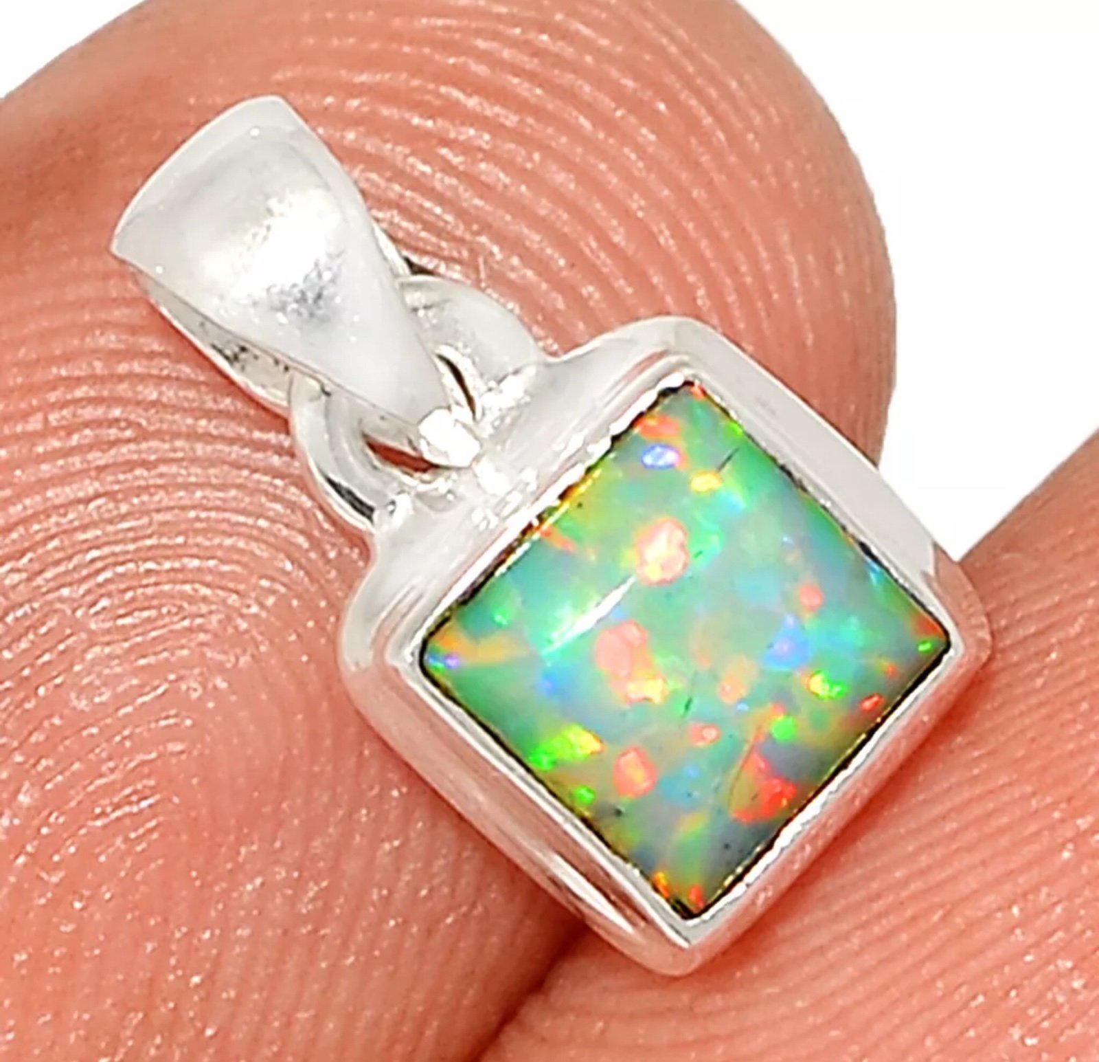Fire Opal pendant set in 925 Sterling Silver
