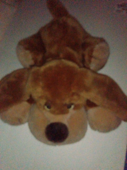 Vintage Russ Samuel, Sad eyes, floppy ears, laying dog brown dog, realsitic dog