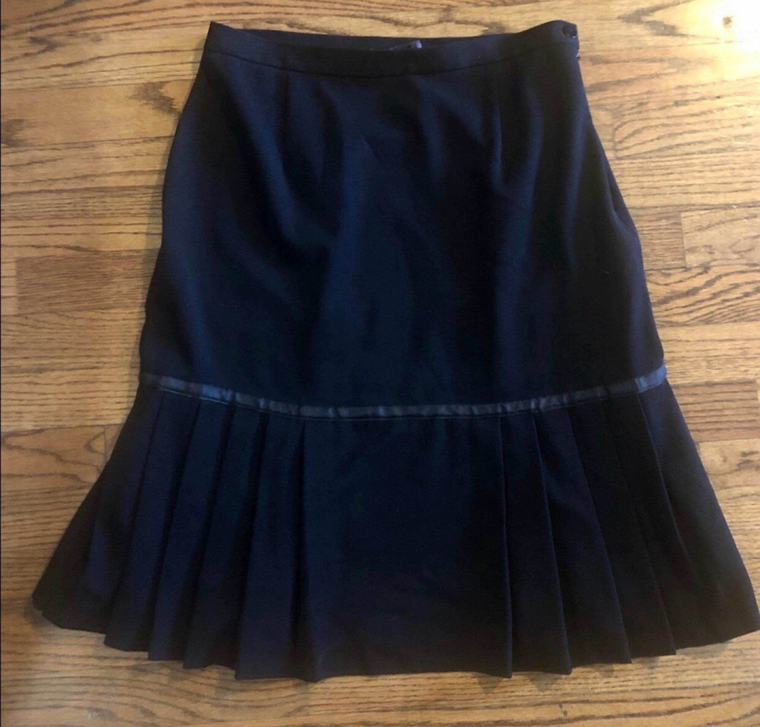Black a line skirt with pleated bottom, size 8 from requirements