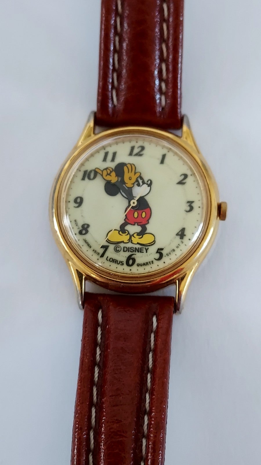 Mickey Mouse Watch. Disney. Gold-toned. Still runs, has new battery. Vintage pie