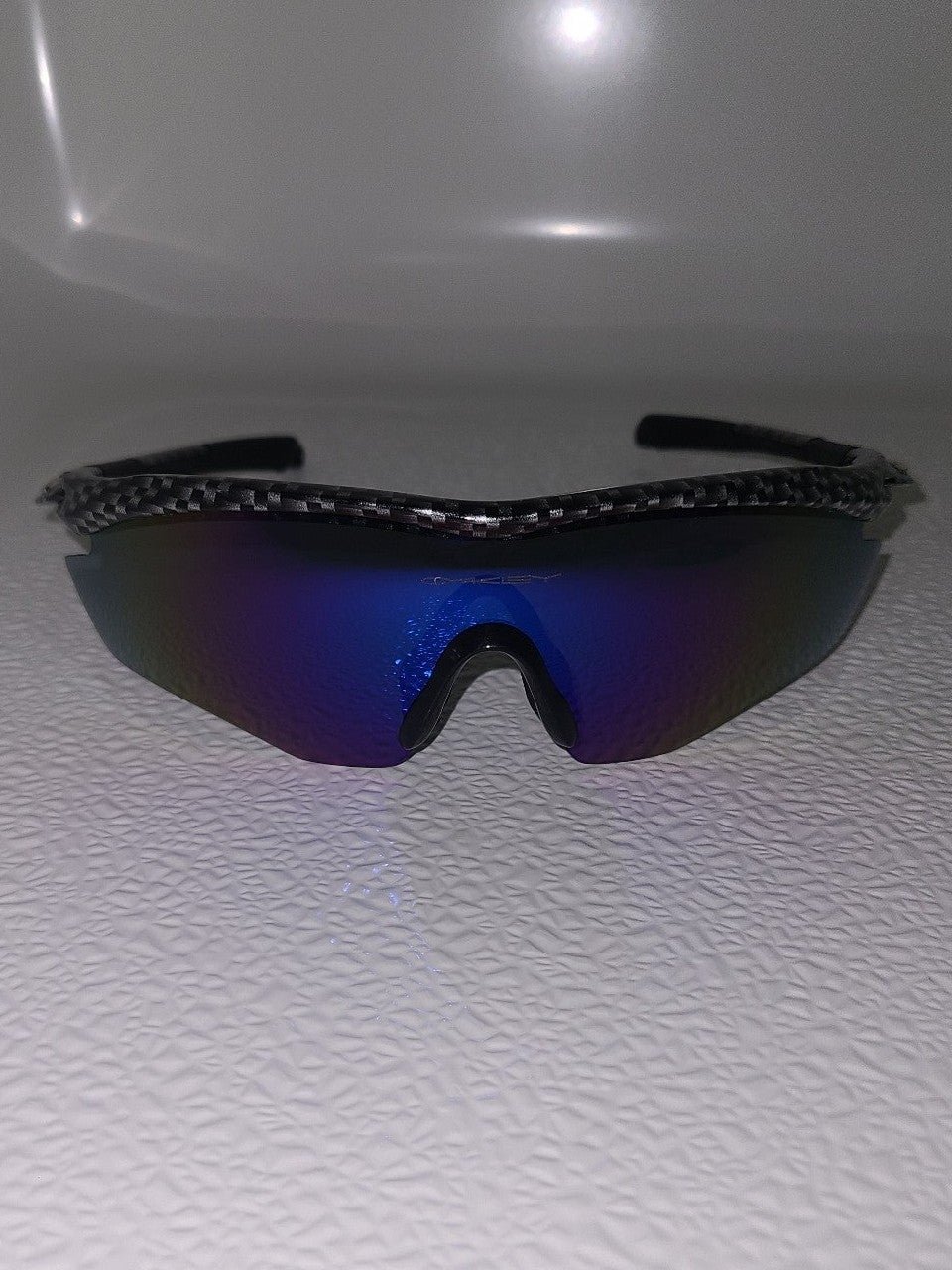 Oakley M2 Frame—Men's Polarized Sunglasses. OO9212-13. Carbon Fiber/Ice Iridium