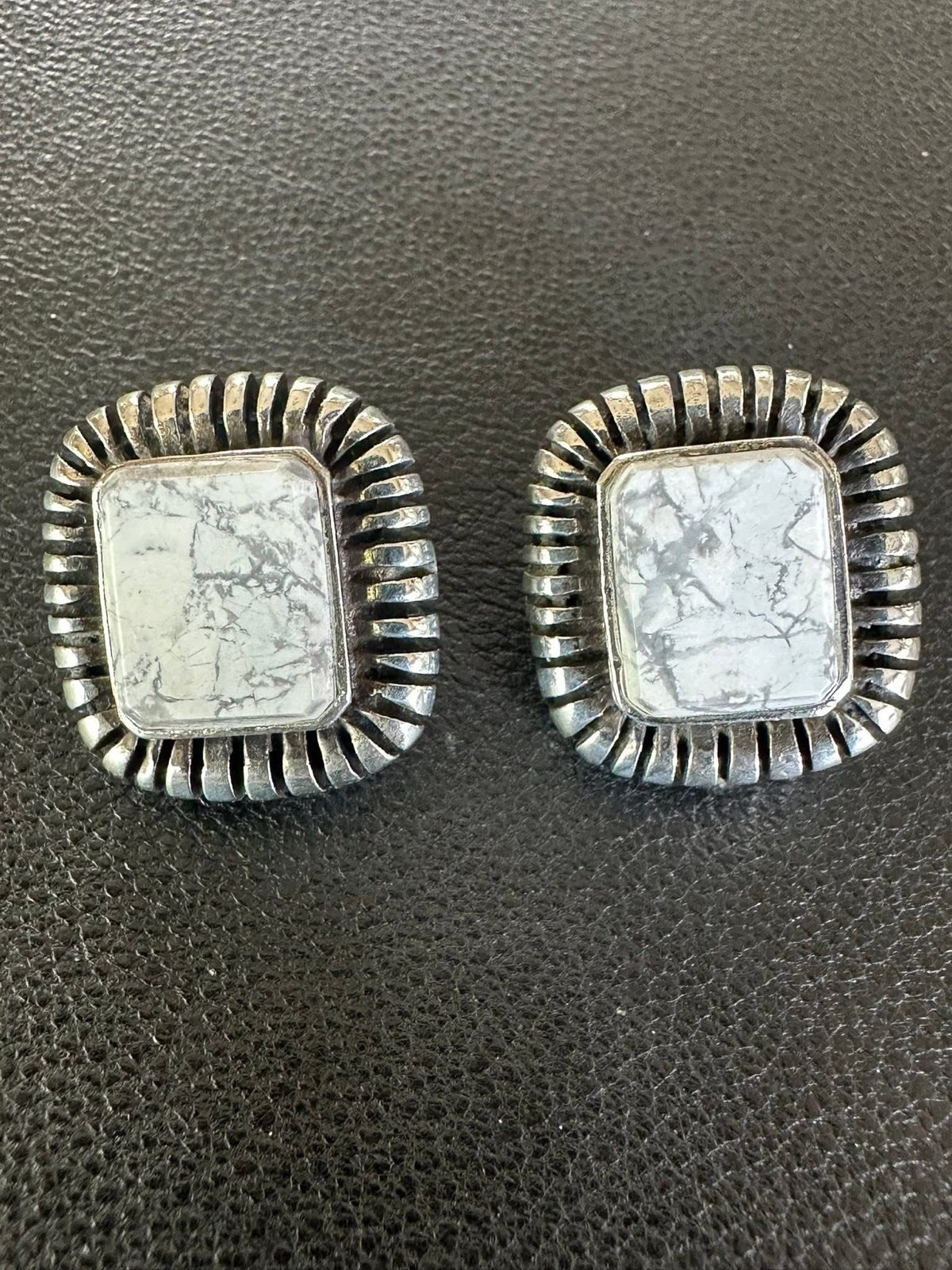 697. Sterling Silver Faux White Buffalo Clip Earrings