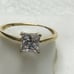14 k solid yellow gold ring with white CZ