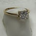 14 k solid yellow gold ring with white CZ
