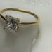 14 k solid yellow gold ring with white CZ