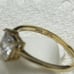 14 k solid yellow gold ring with white CZ