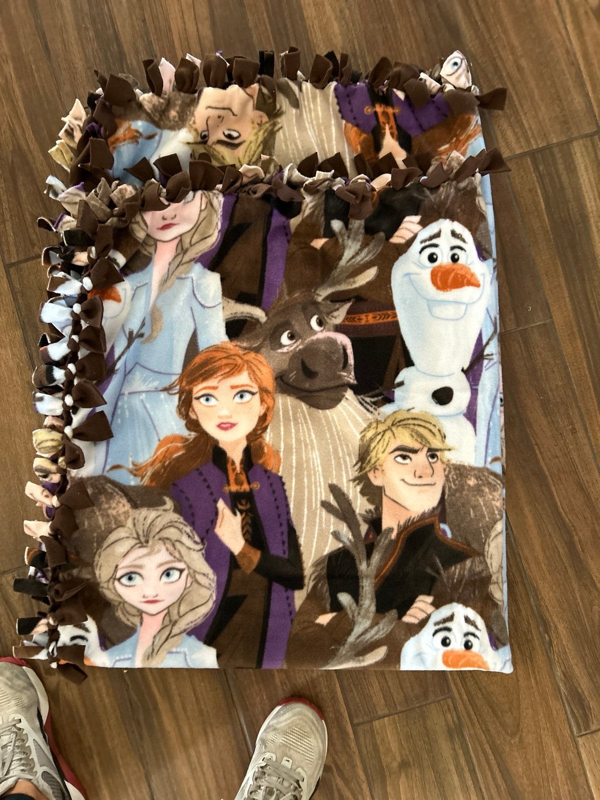 Disney Frozen no sew blanket. 72 x 60, drapes a queen has black on the back.