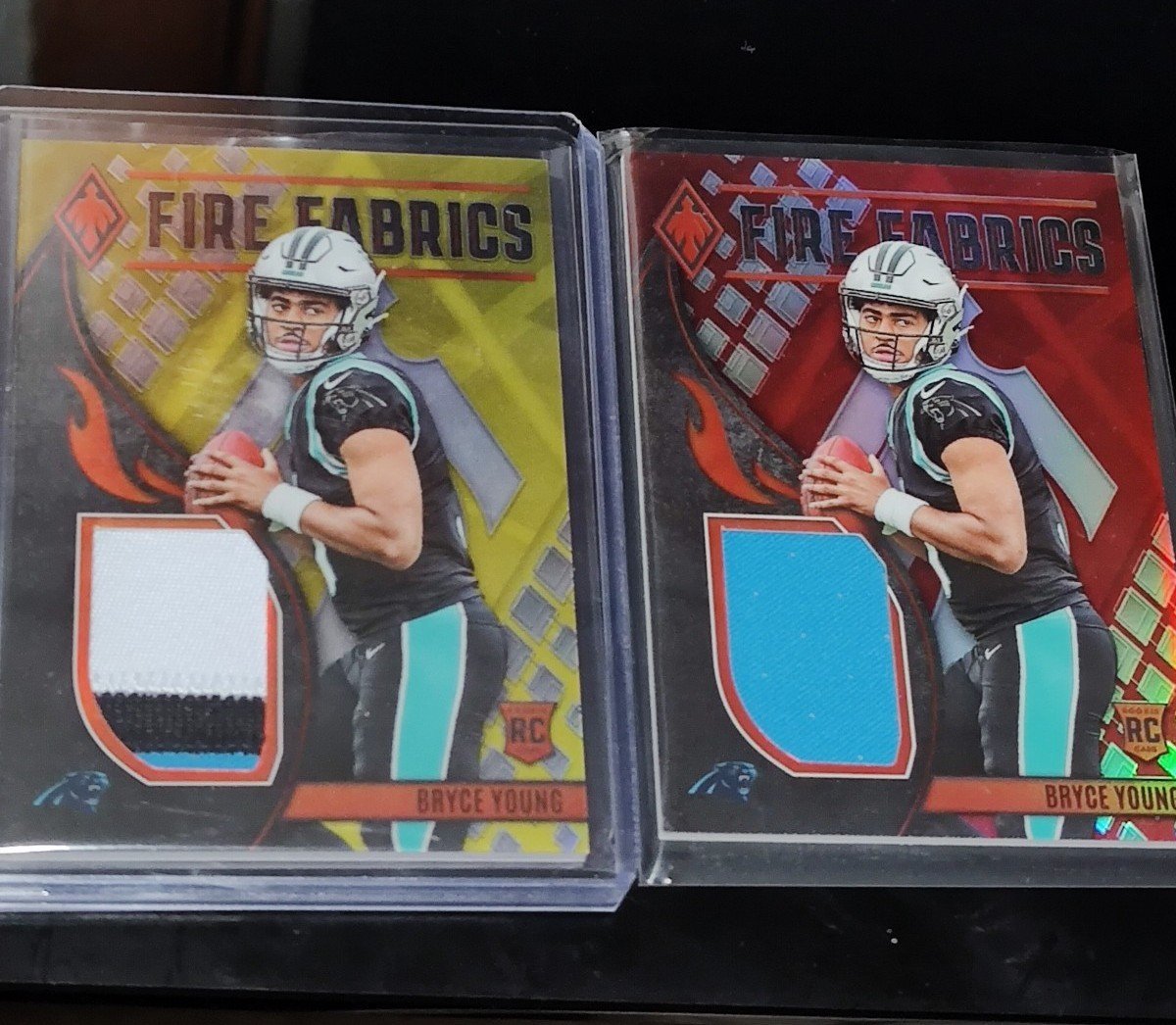 2) Bryce Young 2023 Phoenix Fire Fabrics /35 & /75 RCs & Green Fireworks Card