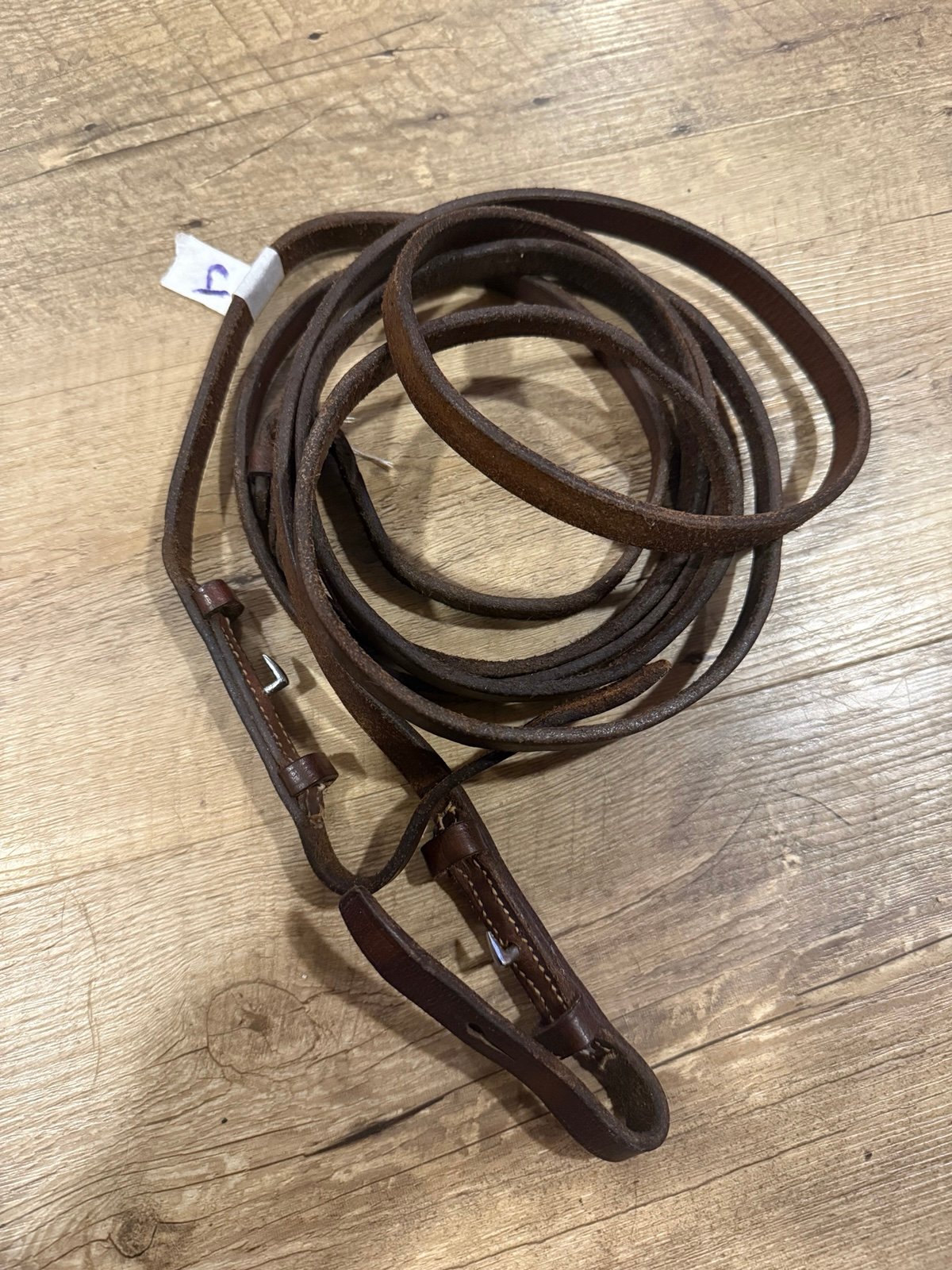 54” light brown curb reins