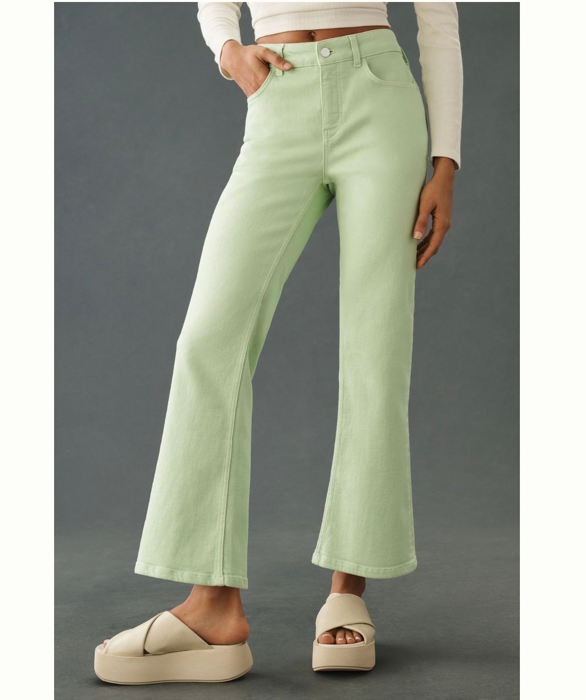 Pilcro the yaya mid rise crop flare jeans in color soft aloe.