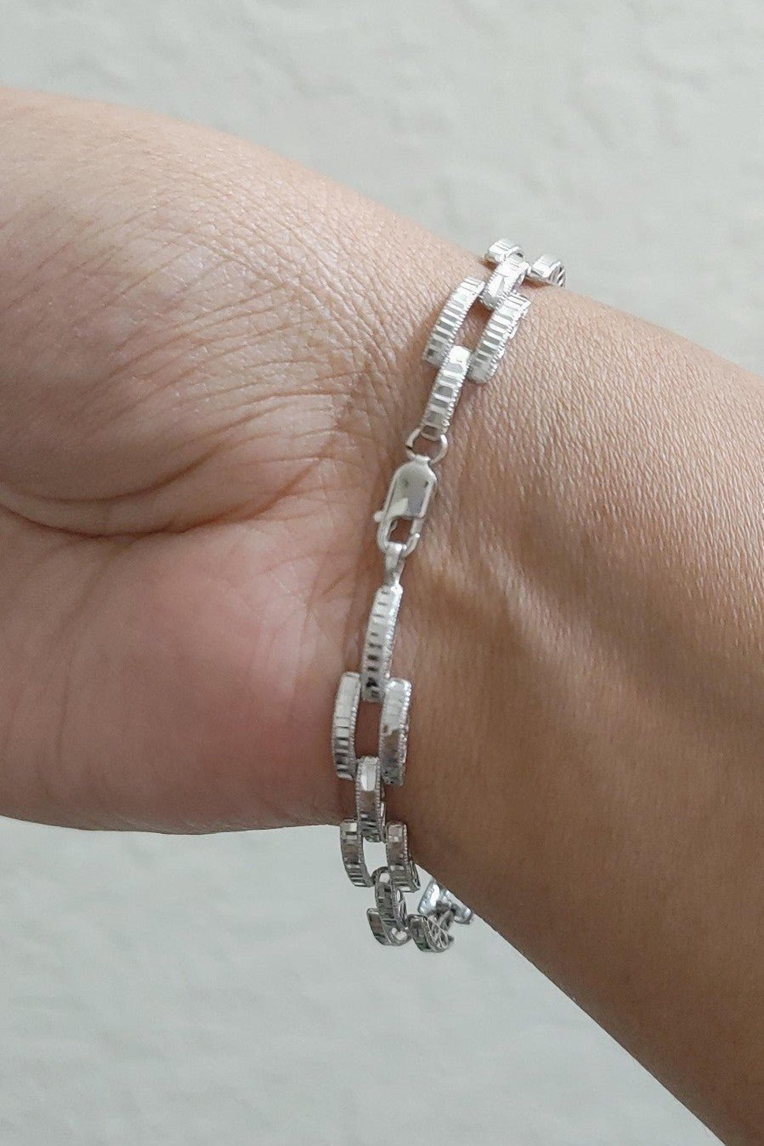 10k White Gold Panther Link Diamond Cut bracelet