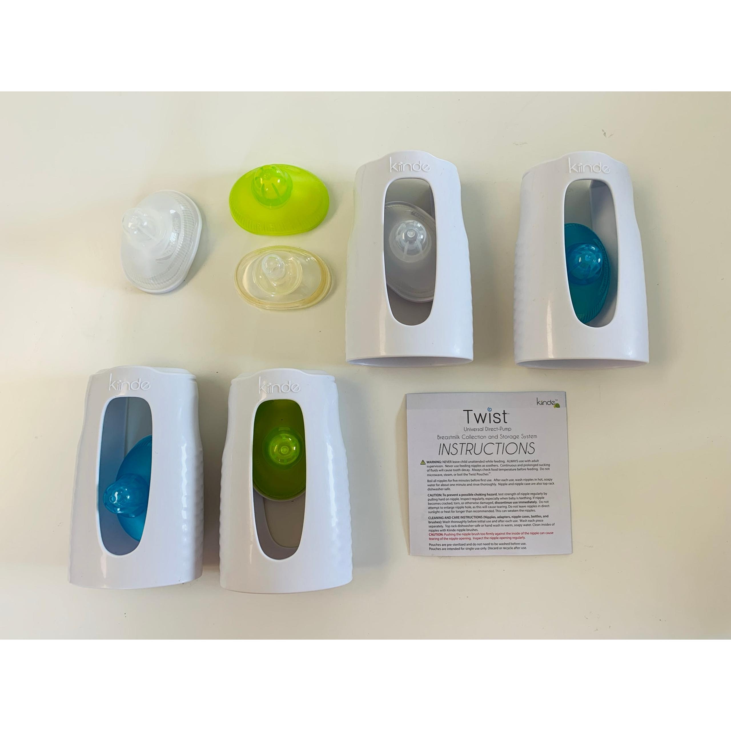 Kiinde Bottle System, 4 bottles, 6 nipples, and 3 bottle brushes