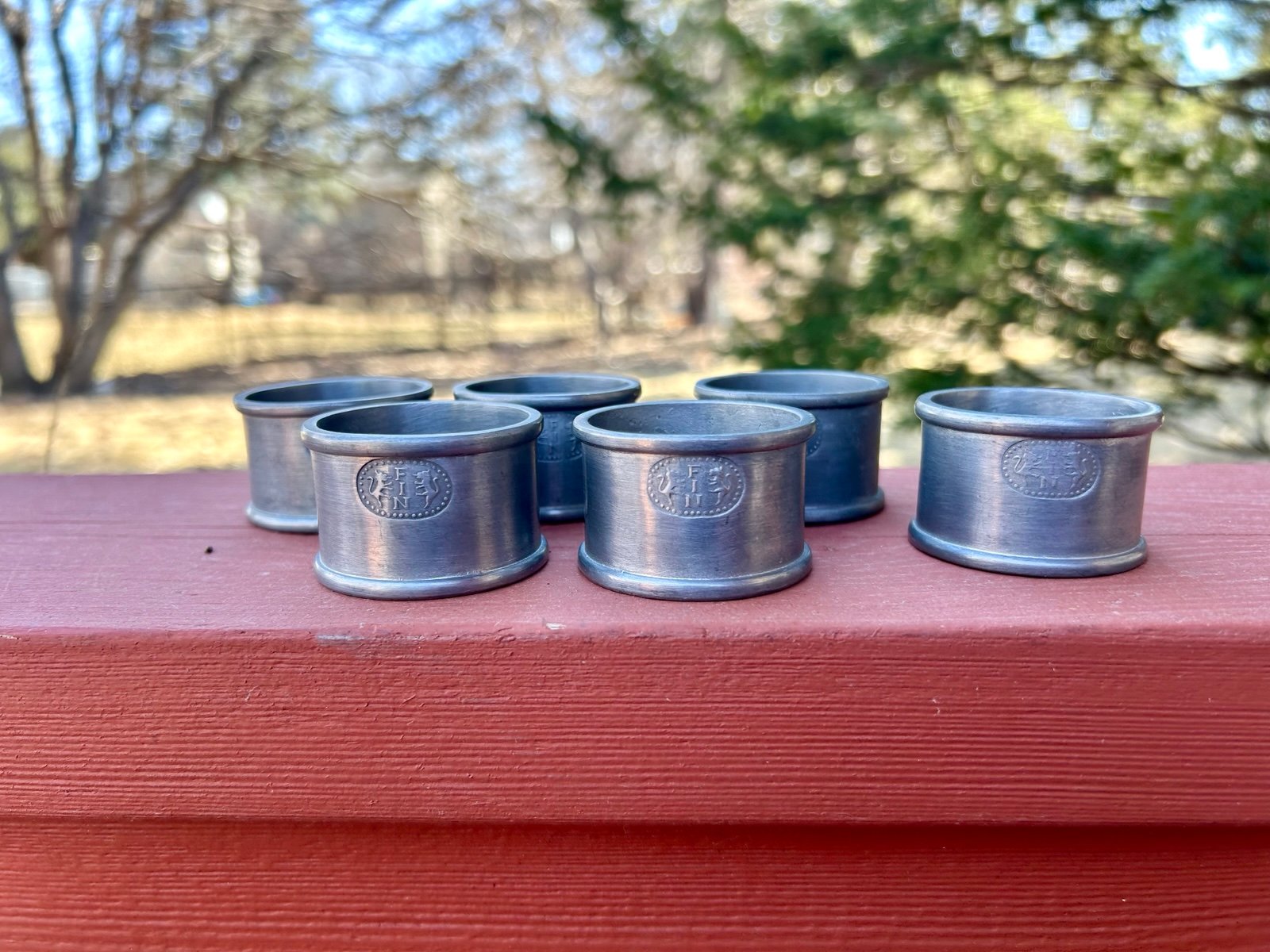 Vintage pewter napkin rings, set of six. Stamped “fin” with two lions, Italy