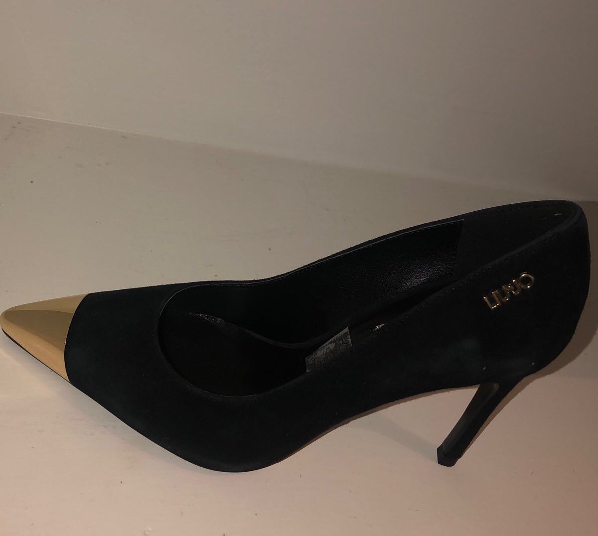Suede black and gold heels