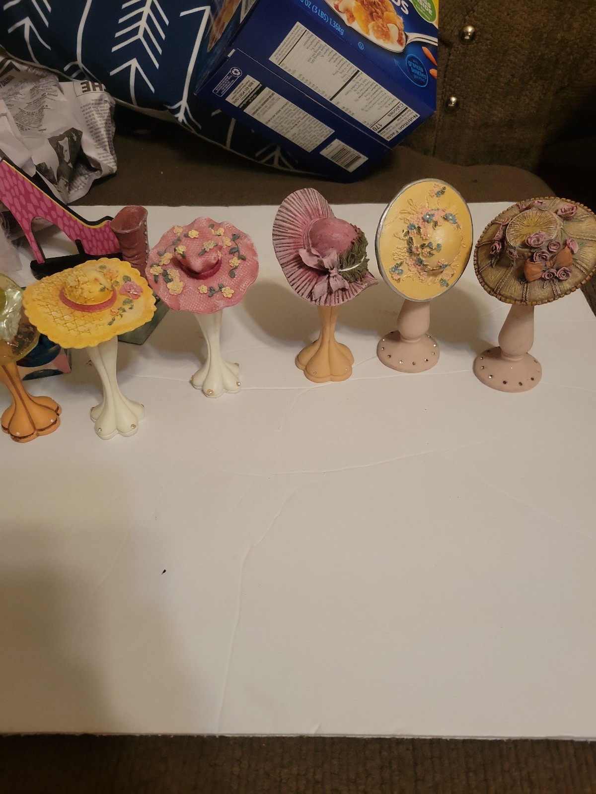 7 vintage hat figurines and stands