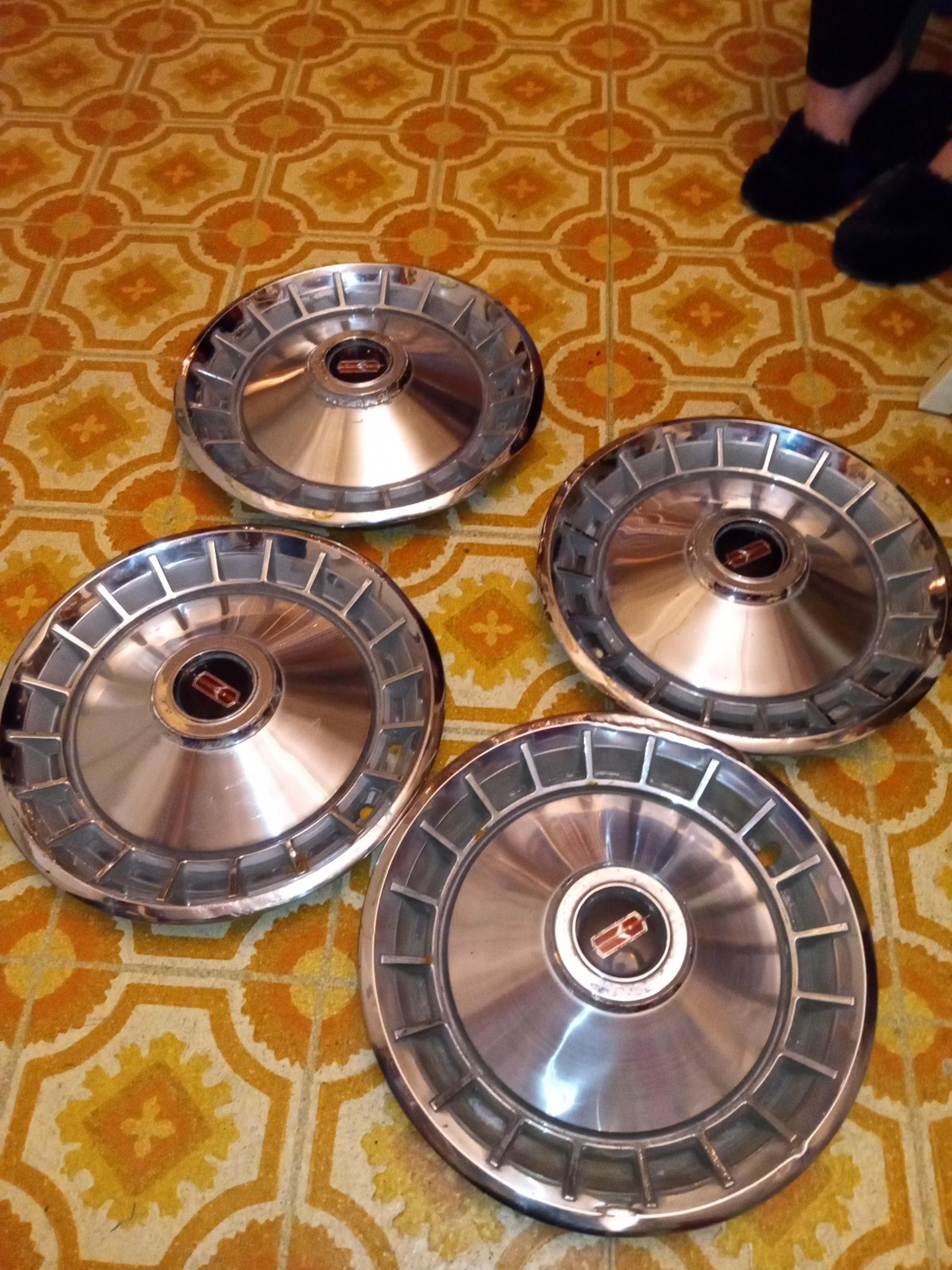 14" Oldsmobile delta 88 hubcap set