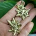 Trifari milk glass white enamel rhinestones leaf earrings