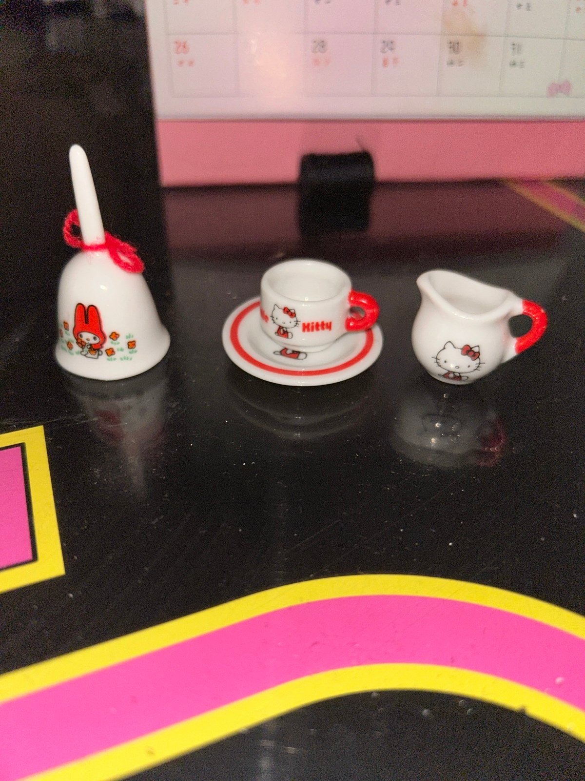 4 Piece Mini mini Hello Kitty Tea cup, saucer, milk pitcher and bell.