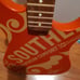 Southern comfort wall hanger guitar