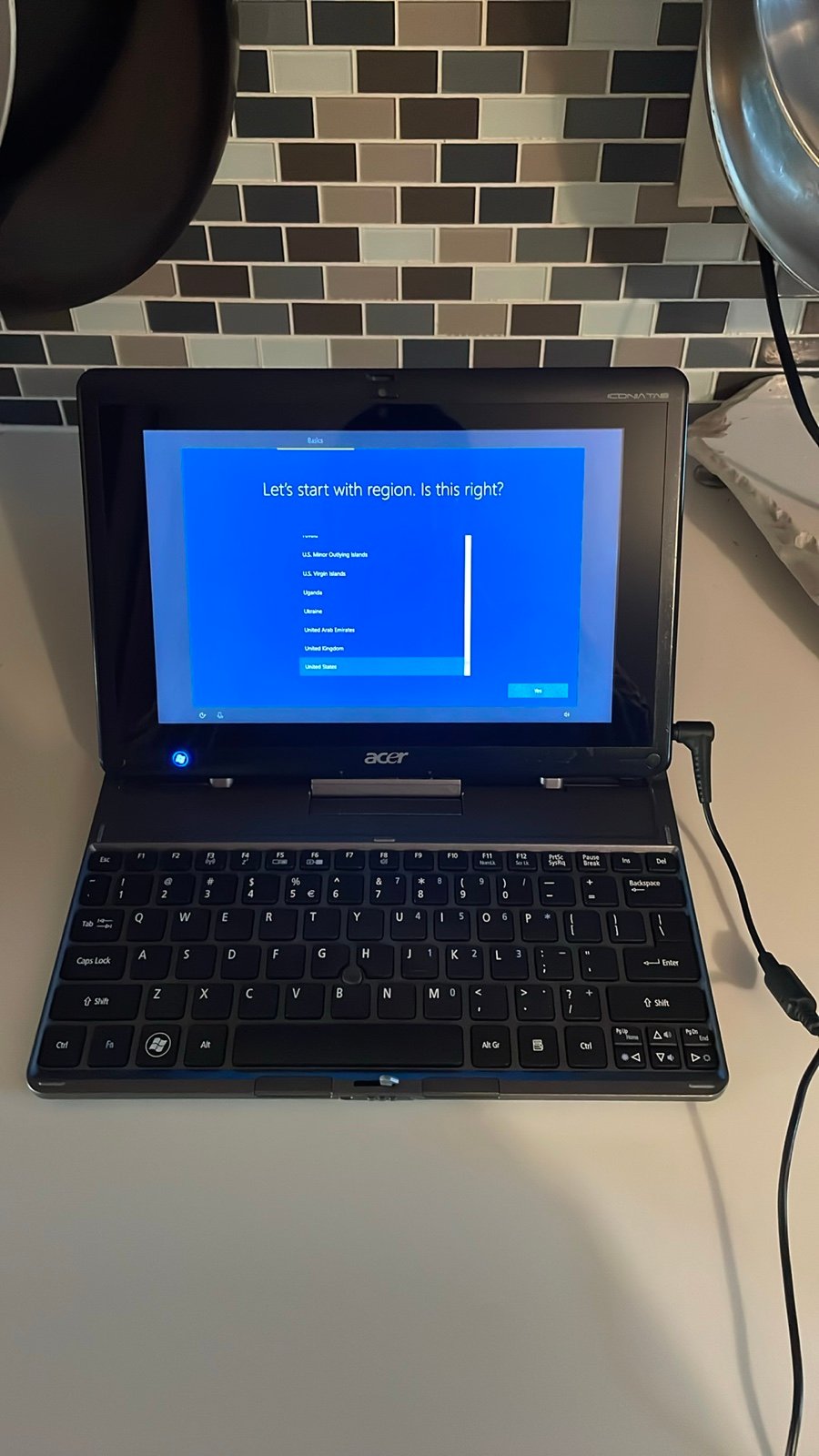 Used Acer Iconia Tab W500 BZ467 with keyboard and charger Works great! Some sli