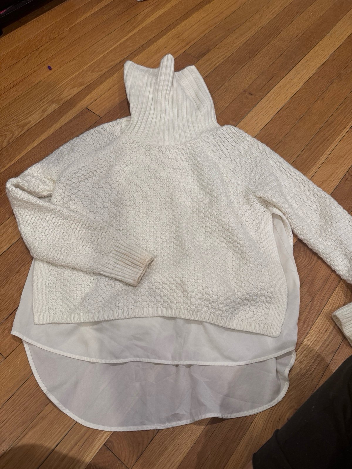 The limited white knit turtleneck