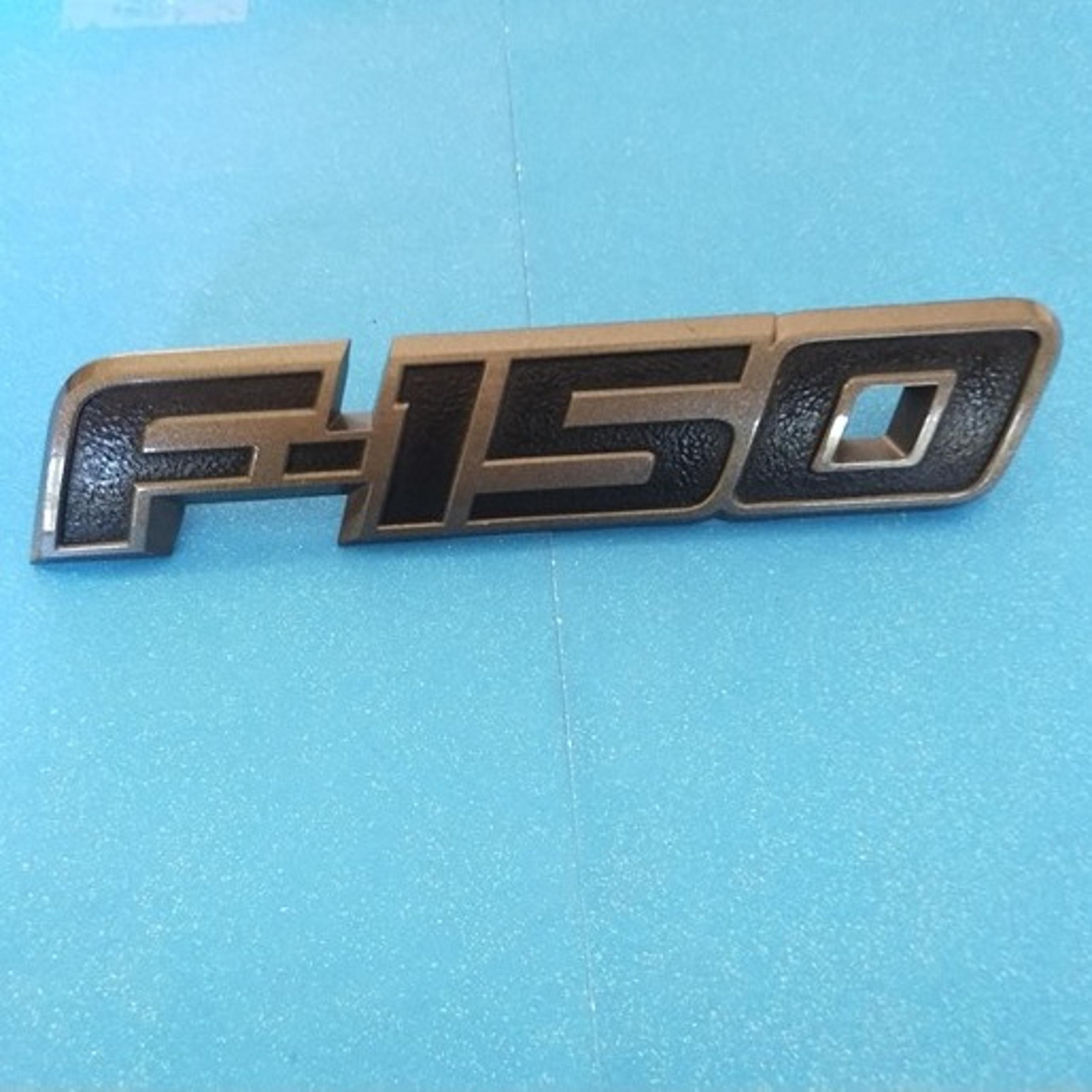 2009-2014 Ford F150 black and charcoal front fender emblem