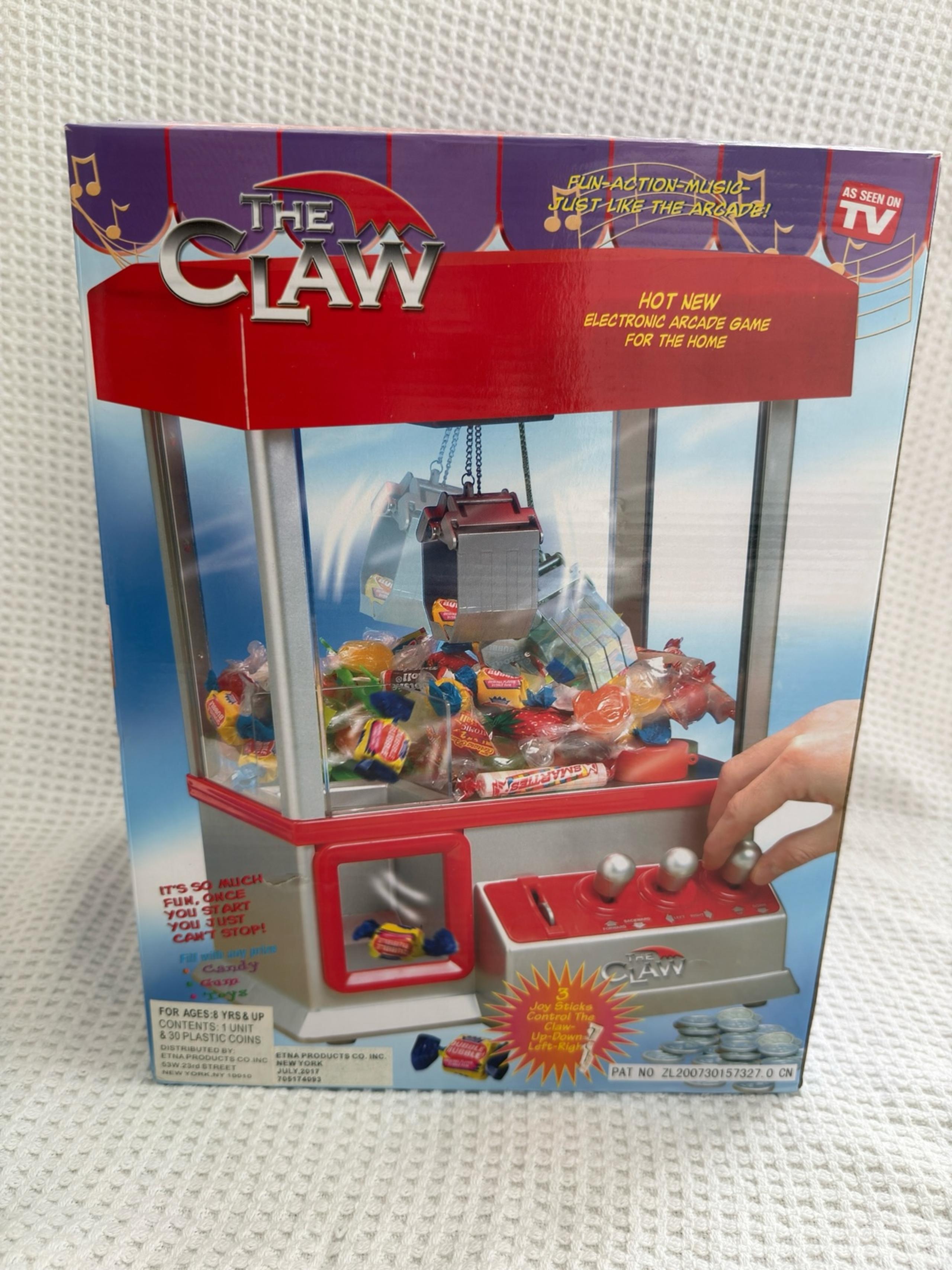 The claw arcade Machine as seen on tv