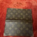 Authentic Louis Vuitton Monogram Bi-fold Wallet.