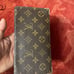 Authentic Louis Vuitton Monogram Bi-fold Wallet.