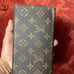 Authentic Louis Vuitton Monogram Bi-fold Wallet.